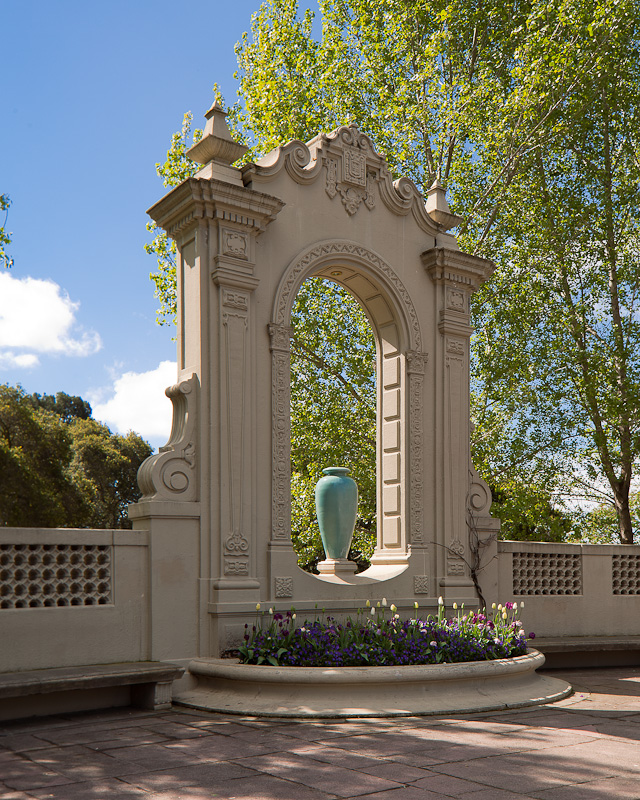 Piedmont Exedra. blue vase with beautiful arch and wrap around seating