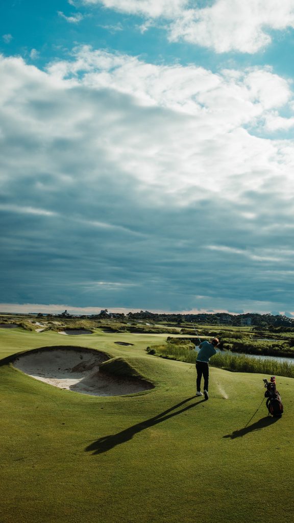 man golfing