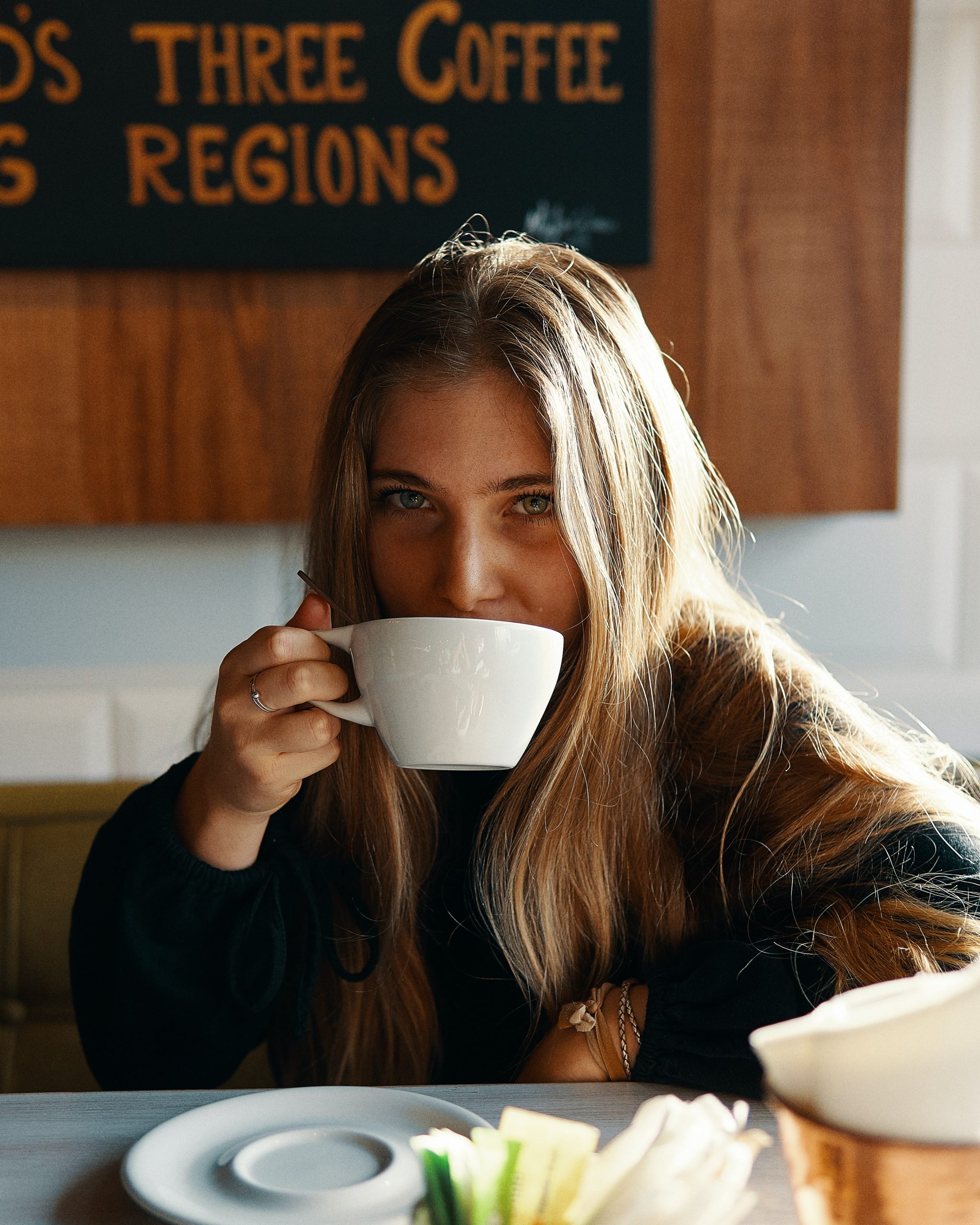 girl sipping coffee